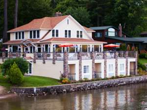 exterior of chelka lodge from the water