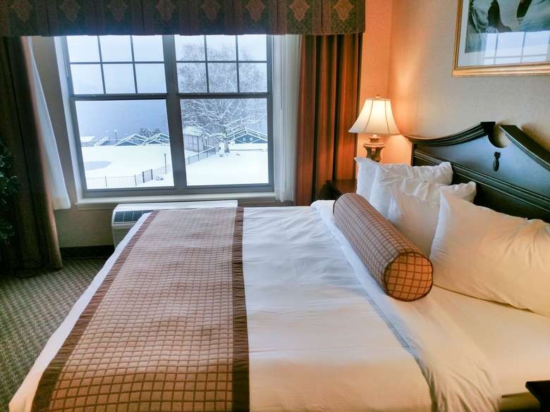 Grand Hotel room with snowy scene outside of the window