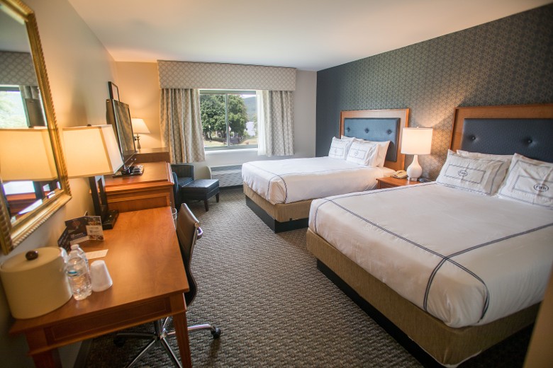 Comfortable and modern double queen room in the Premium Section.