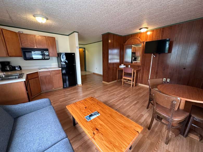 2 bedroom family suite with kitchen, sitting area, and couch