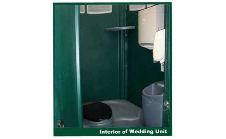 the inside of a portable restroom unit