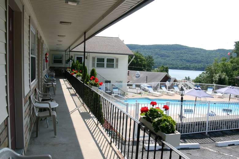 view of the porch and pool area at nordicks inn