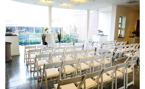 rows of chairs set up for a wedding ceremony