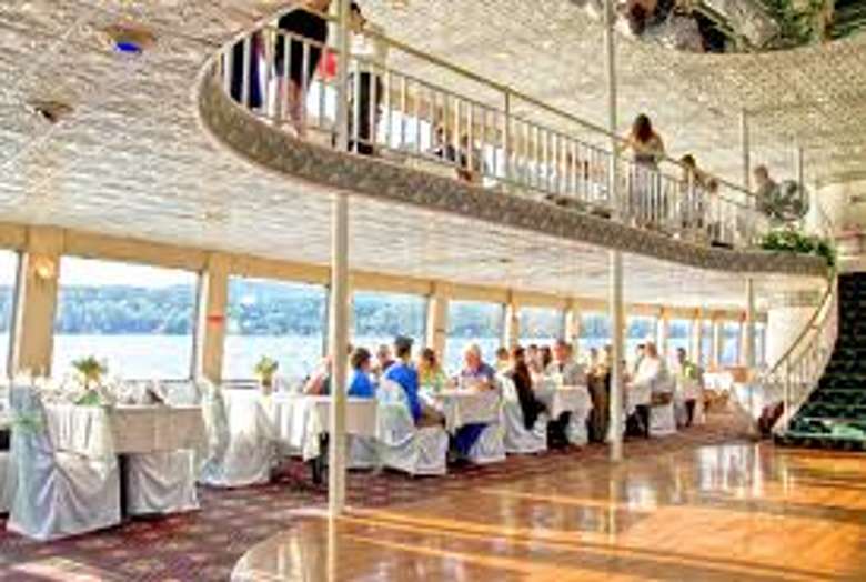 dance floor on a boat surrounded by tables
