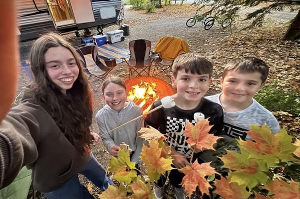 kids at campsite in fall