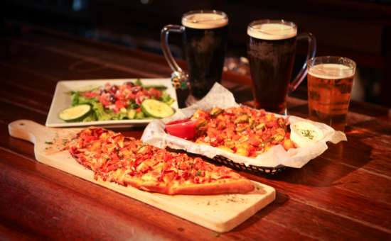 Food and beer on a wooden table
