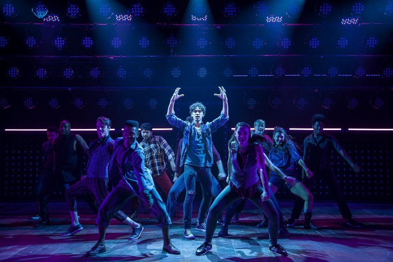 actors dancing on stage