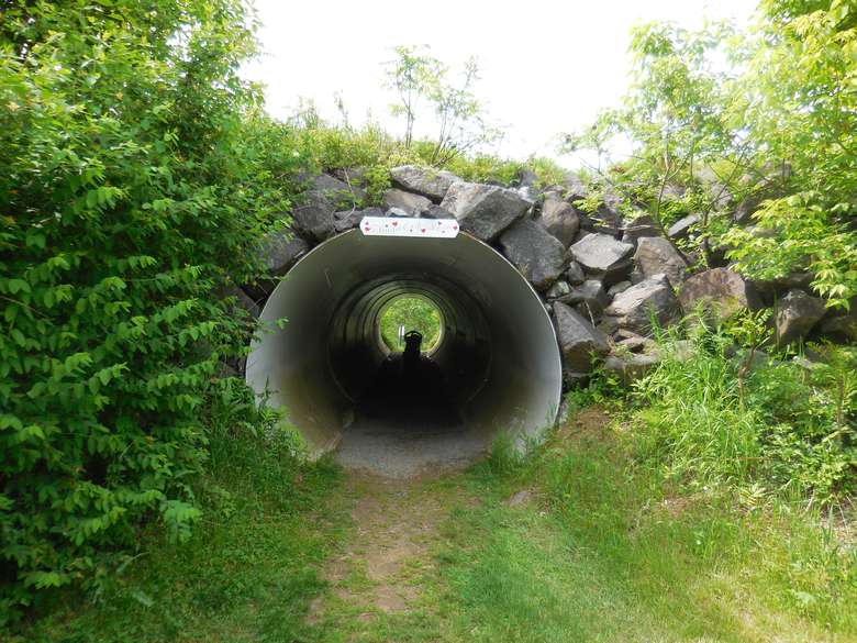 drainage tunnel running under a hill