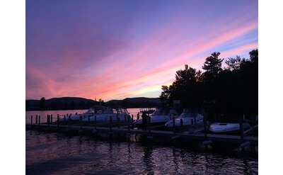 purple and pink sky during evening over a marina