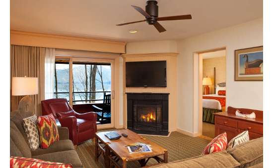 a suite with a fireplace