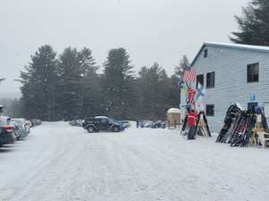 lodge and parking lot in winter