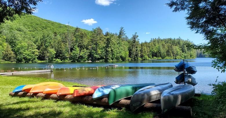kayaks by lake
