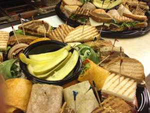 Various sandwiches and wraps on large plater