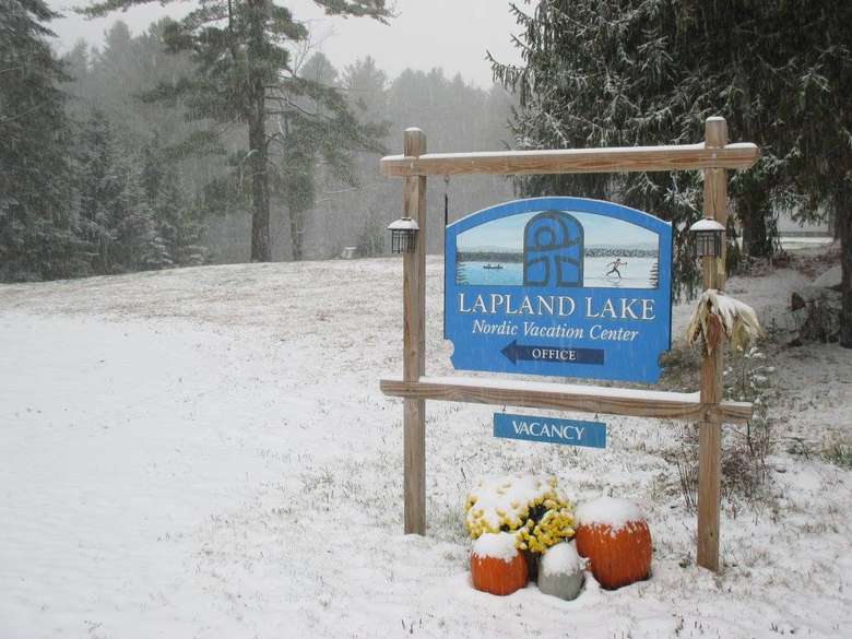 a sign in the snow of Lapland Lake