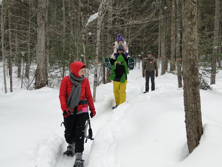 family snowshoeing