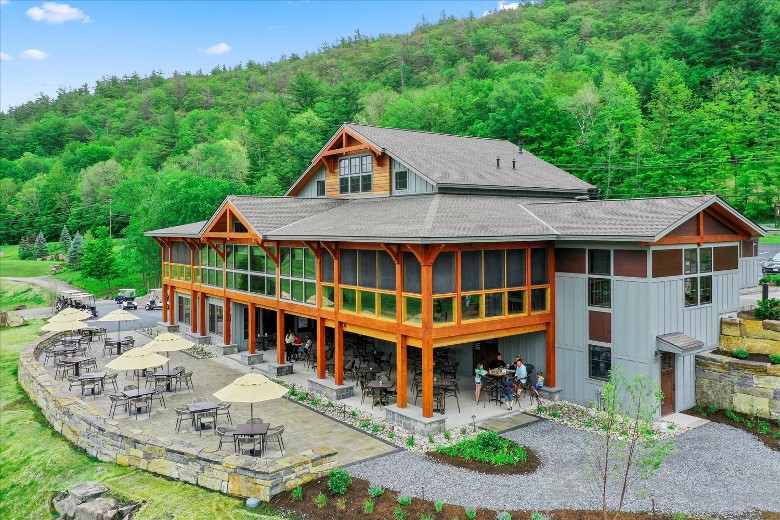a large building with porch and patio