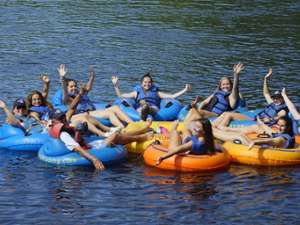 large group near each other on a lazy river trip