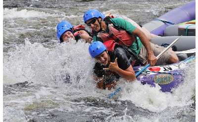 people whitewater rafting