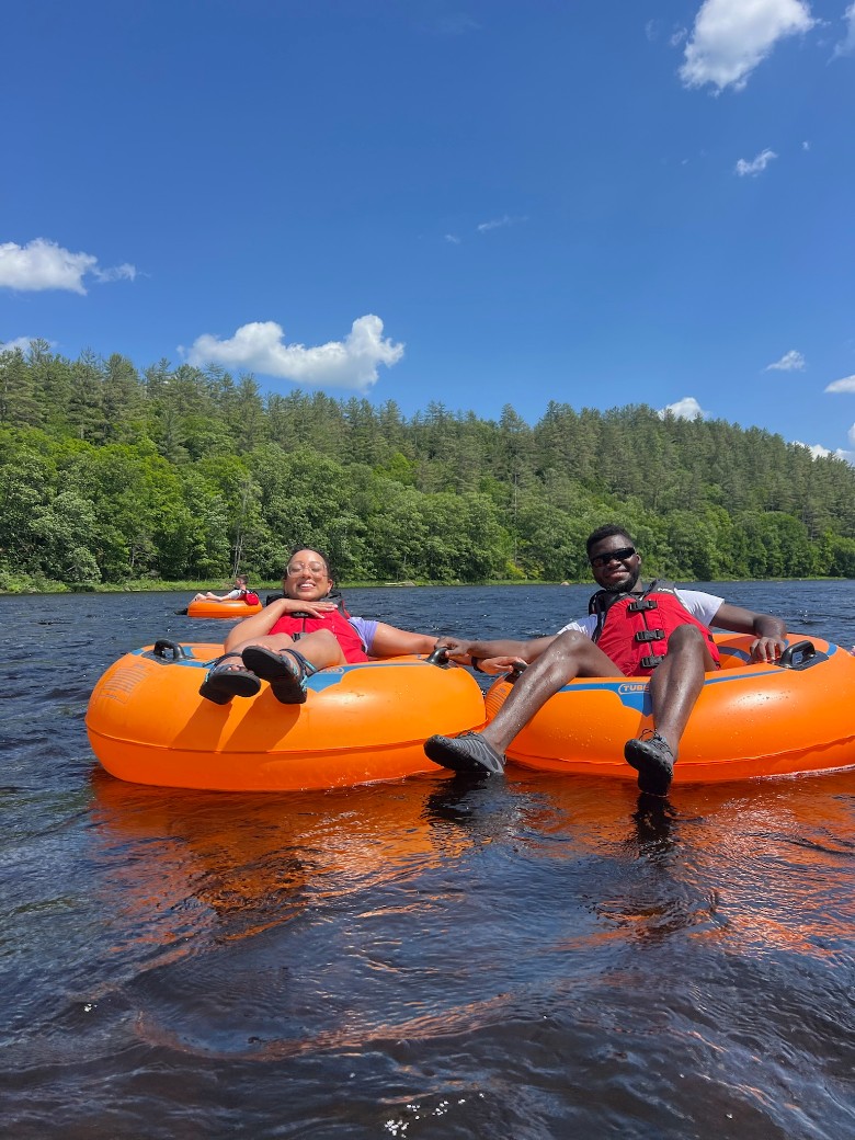 A happy couple tubing