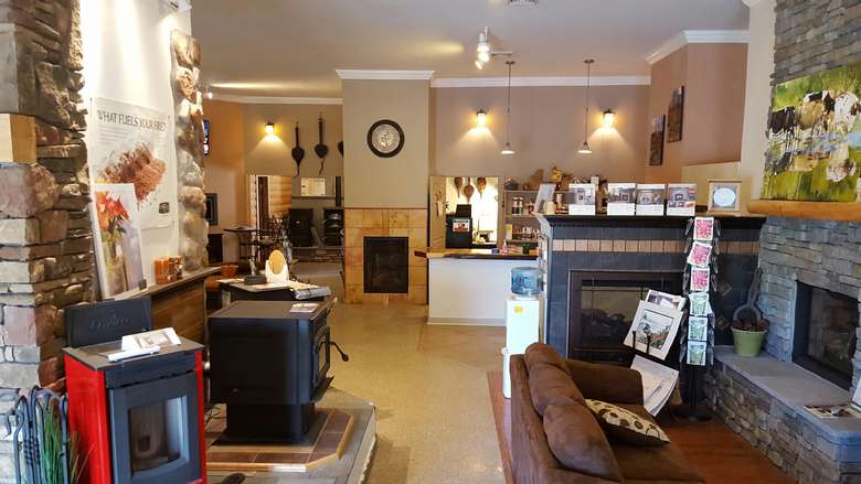 Show room with various fireplaces spread out