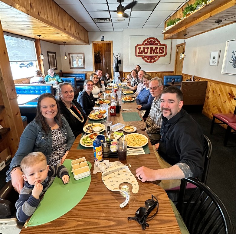 family at restaurant table