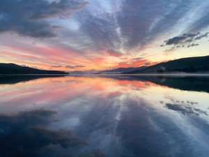 view of a sunset over lake george