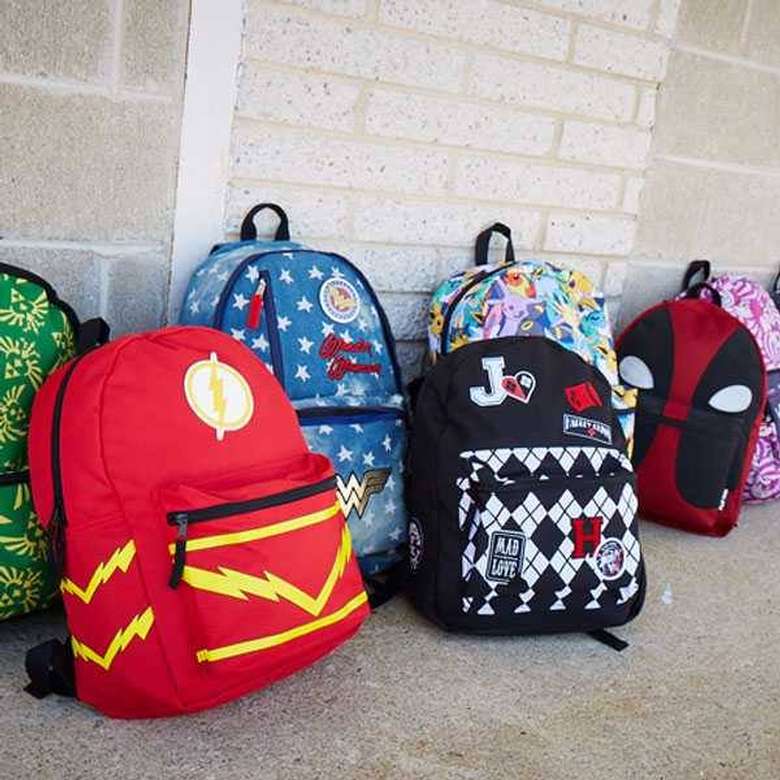 a bunch of colorful backpacks