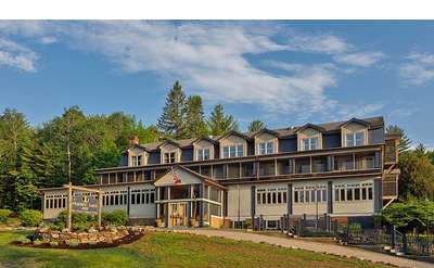 the exterior of friends lake inn