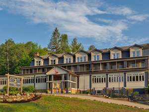 the exterior of friends lake inn