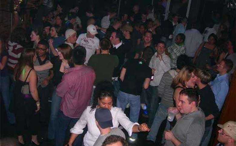 people dancing in a club