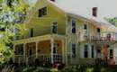 yellow bed and breakfast