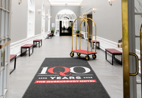 Queensbury Hotel Entrance with 100th Anniversary Logo