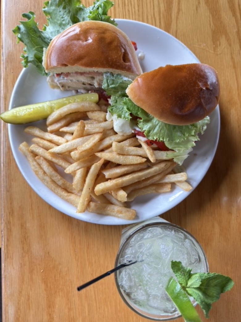 Chicken sandwich with a cocktail