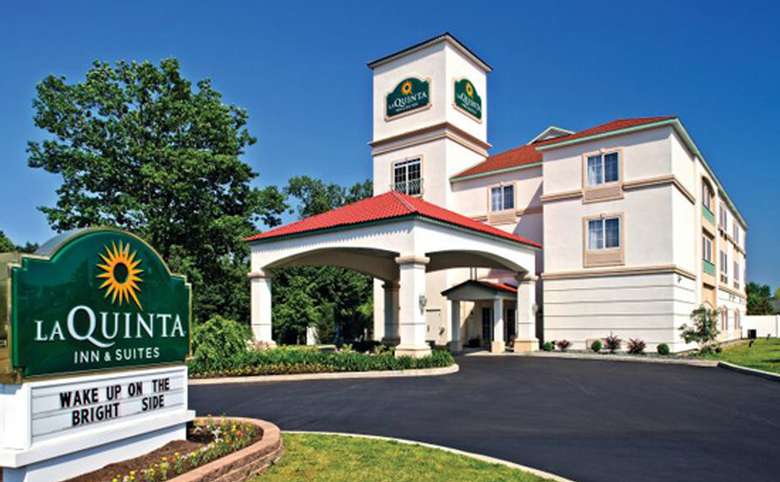 Exterior and sign of La Quinta Inn and Suites