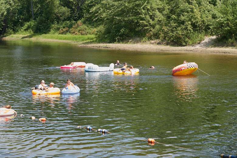 people lazy river tubing