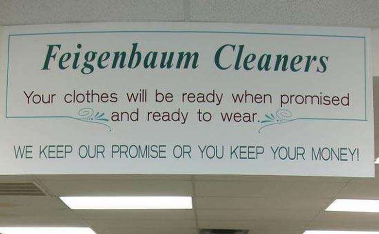 sign that says feigenbaum cleaners your clothes will be ready when promised and ready to wear, we keep our promise or you keep your money