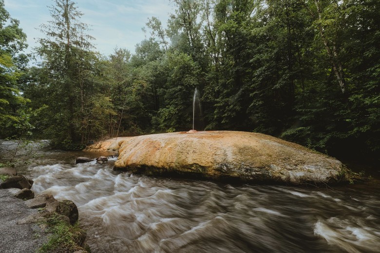a small geyser in a park