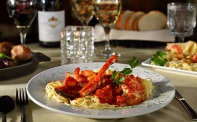 lobster and red sauce over pasta