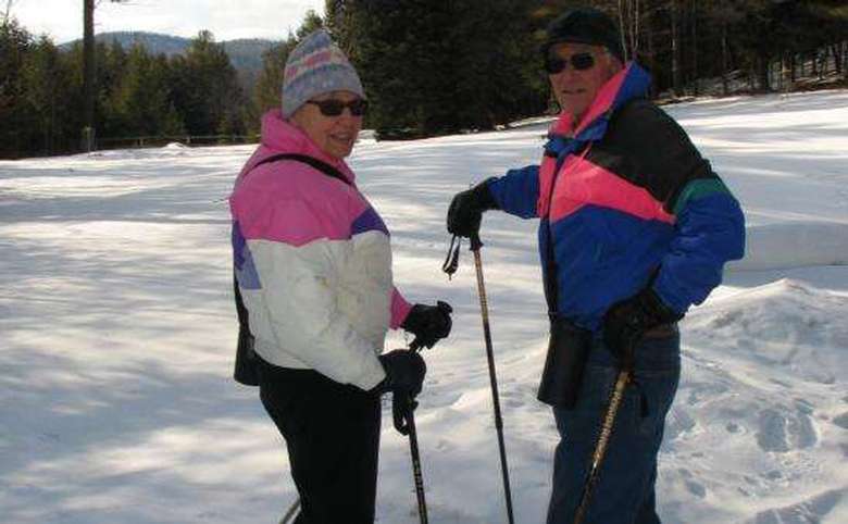 two people snowshoeing in the winter