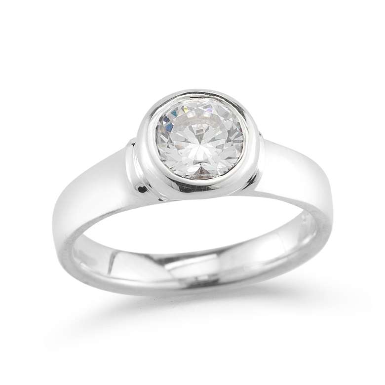 side view of a round inlaid diamond ring showing setting