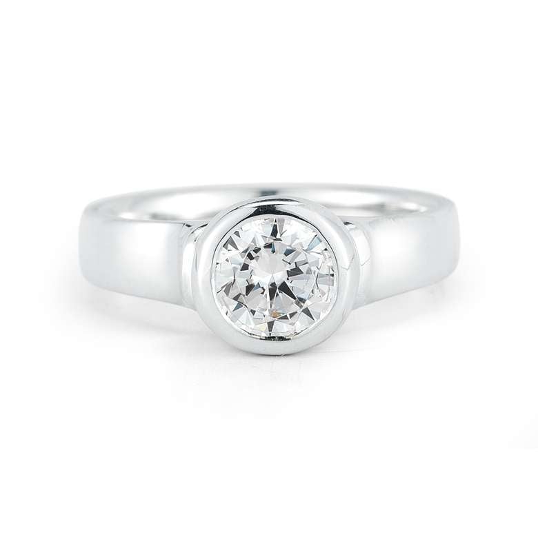 front view of a round inlaid diamond ring