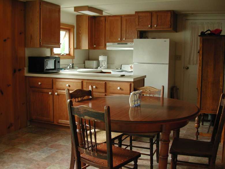full kitchen with dining area