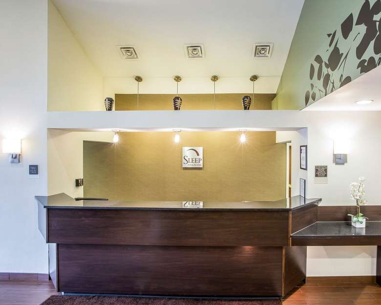 front desk of the sleep inn and suites