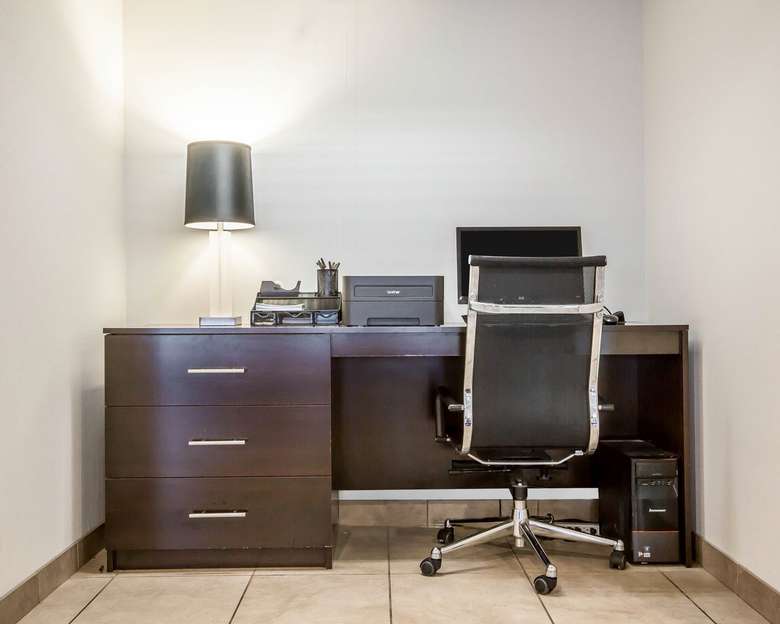 desk with computer in a hotel business center