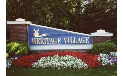 Heritage Village Apartments sign