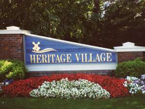 Heritage Village Apartments sign