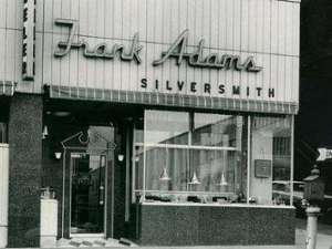 historic photo of the outside of frank adams jewelers