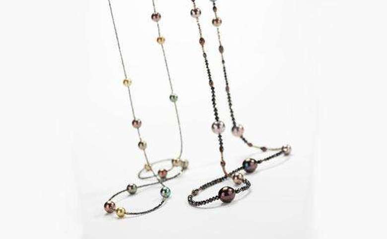 two necklaces with combinations of small and large beads
