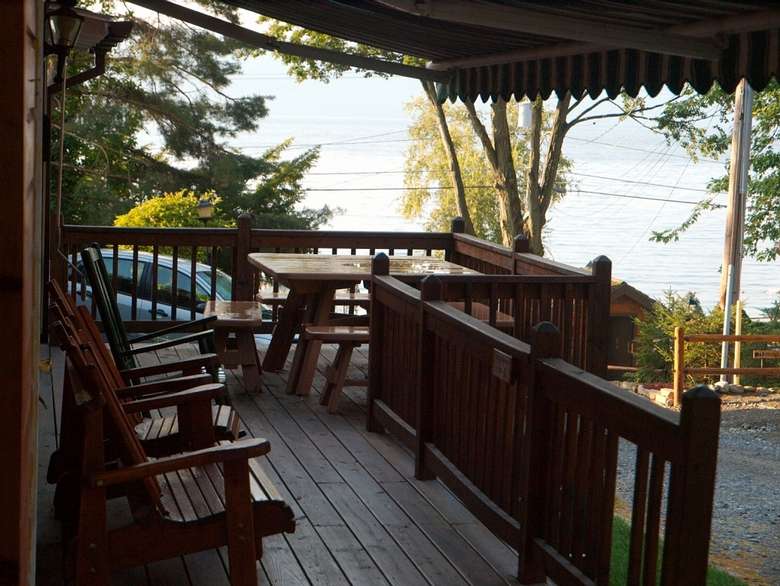 chairs and picnic table on deck