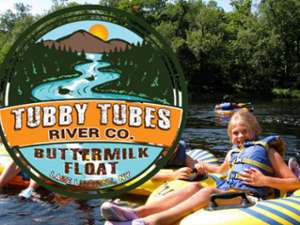 Tubby Tubes Logo over river tubing pic